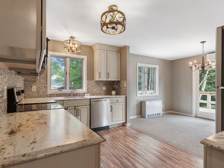 A kitchen at 276 Mountain View Ln featuring: cabinetry, property, countertop, plant, houseplant, kitchen sink, sink, wood, kitchen, interior design