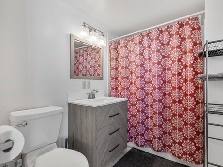 An image featuring building, property, plumbing fixture, purple, sink, bathroom cabinet, textile, lighting, interior design, architecture at 5442 Clarkstown Rd.