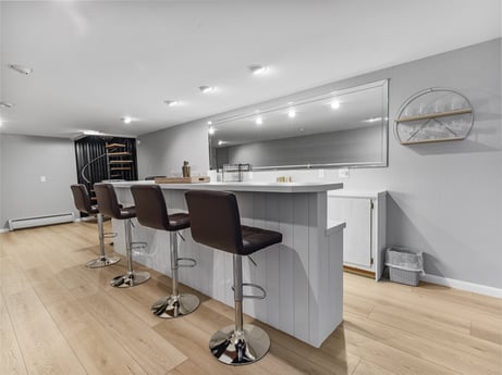 An image featuring furniture, office chair, building, cabinetry, table, chair, floor, flooring, countertop, wood at 104 Stony Mountain Rd.