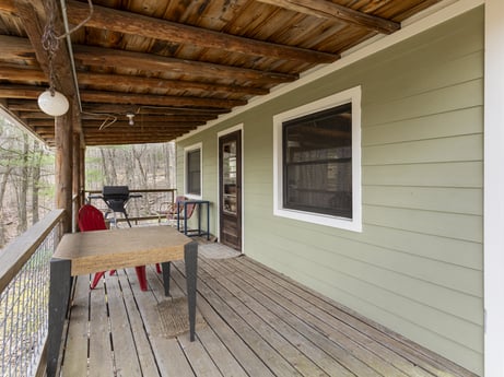 An image featuring window, building, wood, porch, interior design, floor, flooring, wood stain, house, wall at English Hollow Ln.