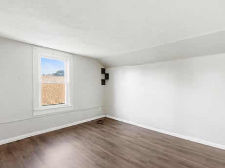 An image featuring window, wood, fixture, building, flooring, floor, hall, wood stain, laminate flooring, hardwood at 132 Wilbur St.