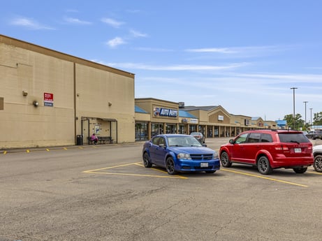 An image featuring car, automotive parking light, wheel, tire, land vehicle, sky, vehicle, cloud, automotive design, automotive lighting at 1040 Center St.