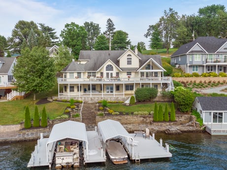 An image featuring water, plant, boat, sky, property, window, building, watercraft, tree, vehicle at 218 Point Rd.