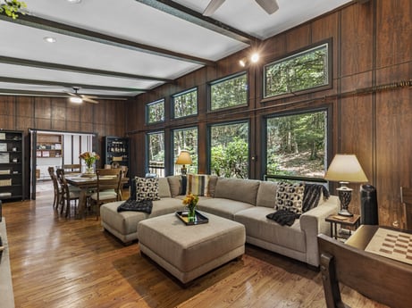 An image featuring furniture, property, couch, table, picture frame, living room, plant, interior design, lighting, architecture at 104 Stony Mountain Rd.