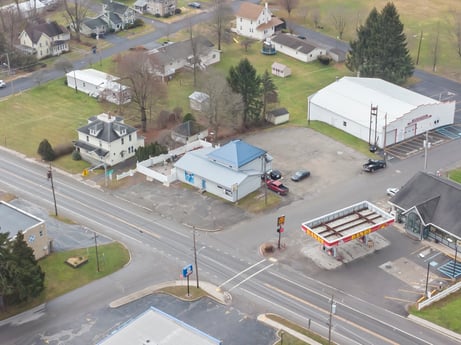 An image featuring property, building, infrastructure, asphalt, motor vehicle, window, land lot, transport hub, urban design, plant at 199 State St.