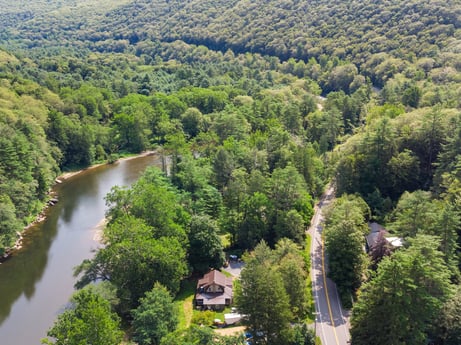 An image featuring water, tree, plant, natural landscape, biome, landscape, fluvial landforms of streams, urban design, forest, riparian zone at 9224 PA-87.