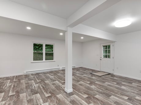 An image featuring window, fixture, wood, hall, flooring, floor, building, material property, real estate, ceiling at 127 Shore Dr.