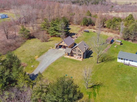 An image featuring plant, building, tree, house, natural landscape, land lot, window, biome, grass, landscape at 144 Milton Ln.