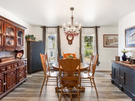 An image featuring furniture, picture frame, cabinetry, chair, table, drawer, wood, interior design, lighting, floor at 105 Thomas St.