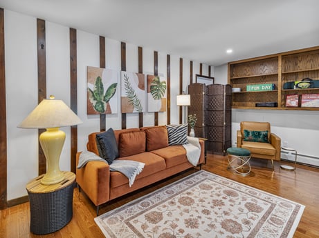 An image featuring furniture, property, couch, interior design, wood, chair, flooring, floor, comfort, living room at 104 Stony Mountain Rd.