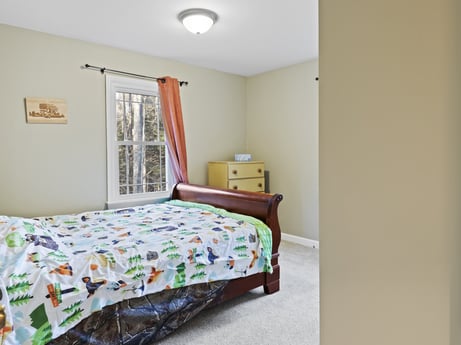 An image featuring furniture, building, window, comfort, pillow, wood, bed frame, shade, interior design, bed at 1061 Muncy St.