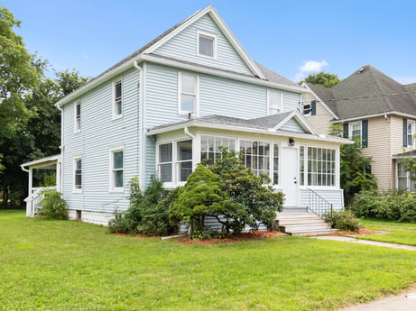 An image featuring plant, building, sky, window, house, fixture, tree, land lot, door, grass at 203 Harrison St.