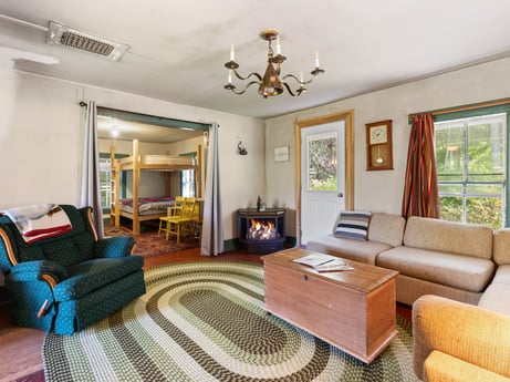 An image featuring furniture, property, picture frame, table, couch, wood, comfort, lighting, interior design, floor at 1039 Old Bernice Rd.
