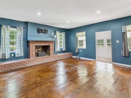 An image featuring window, fixture, wood, hall, floor, flooring, wood stain, hardwood, real estate, laminate flooring at 5442 Clarkstown Rd.
