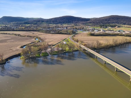 An image featuring water, sky, plant, cloud, mountain, natural landscape, tree, fluvial landforms of streams, highland, thoroughfare at River Access Rd.