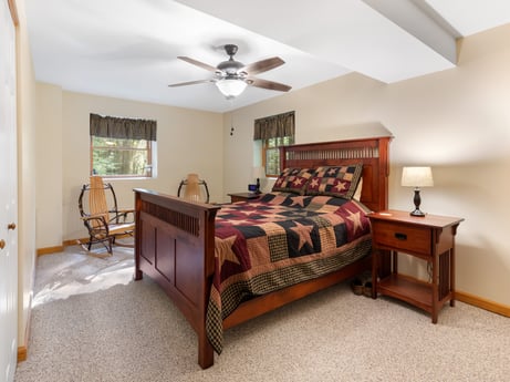 An image featuring ceiling fan, furniture, building, window, comfort, wood, lighting, table, bed frame, interior design at 459 Pine Hill Dr.