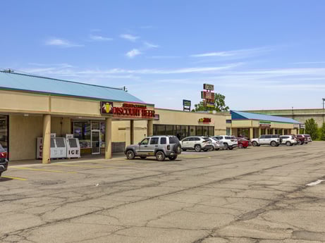 An image featuring automotive parking light, wheel, cloud, sky, tire, car, vehicle, motor vehicle, gas, retail at 1040 Center St.