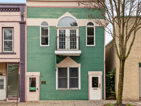 An image featuring window, property, building, fixture, door, architecture, plant, brick, wood, neighbourhood at 213 Main St.