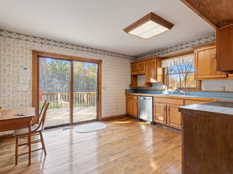 An image featuring furniture, cabinetry, property, countertop, window, chair, wood, table, interior design, floor at 2266 Liberty Corners Rd.