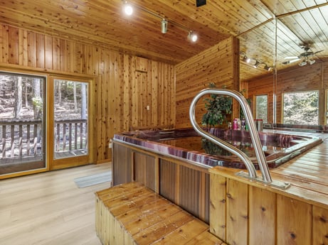 An image featuring window, wood, interior design, beam, floor, flooring, wood stain, hardwood, real estate, tree at 104 Stony Mountain Rd.