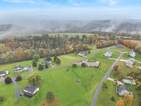 An image featuring cloud, sky, plant, nature, natural landscape, natural environment, tree, land lot, highland, biome at Country View Dr.