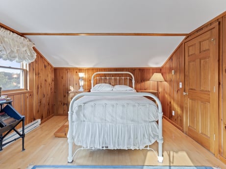 An image featuring furniture, building, comfort, bed frame, wood, bed, floor, house, hardwood, wood stain at 130 Haighs Pond Rd.