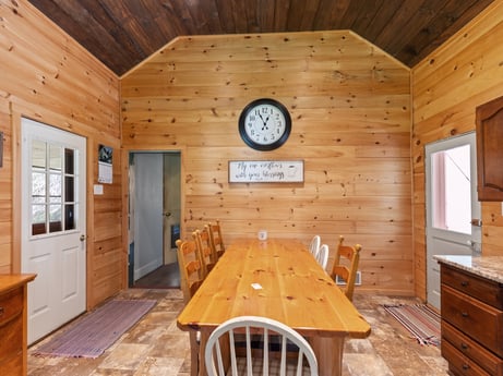 An image featuring property, cabinetry, furniture, building, wood, lighting, table, fixture, drawer, interior design at 1039 Old Bernice Rd.