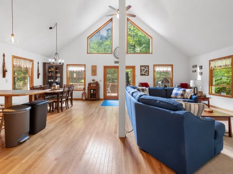 An image featuring picture frame, furniture, table, wood, interior design, house, hall, living room, building, floor at 459 Pine Hill Dr.