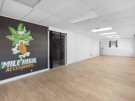 An image featuring building, wood, floor, flooring, hall, hardwood, laminate flooring, event, ceiling, wood stain at 302 N Keystone Ave.