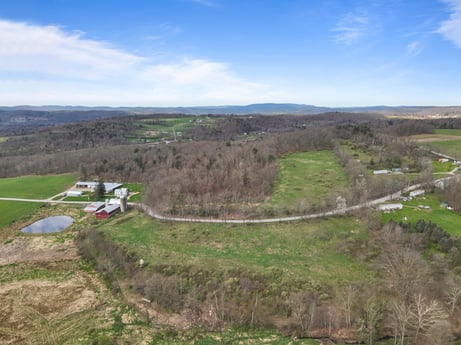 An image featuring cloud, sky, plant, natural landscape, land lot, highland, terrain, grass, plain, grassland at 525 Spring Hill Rd.