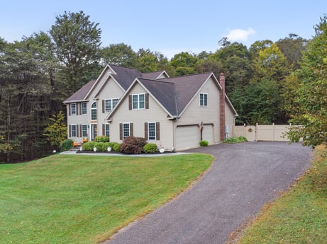 An image featuring plant, building, sky, window, house, tree, land lot, grass, cottage, cloud at 92 Sunrise Dr.