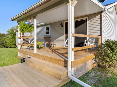 An image featuring plant, building, property, window, sky, wood, house, shade, land lot, grass at 62 Leons Rd.