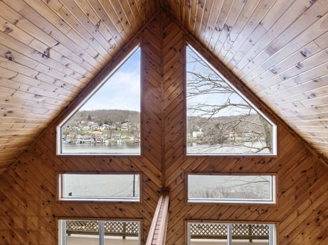 An image featuring wood, rectangle, shade, beam, floor, wood stain, plank, symmetry, ceiling, siding at 815 Lakeside Dr.