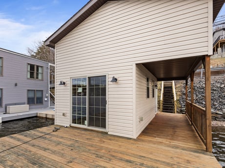 An image featuring building, property, window, sky, wood, interior design, cloud, house, shade, cottage at 815 Lakeside Dr.