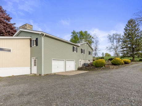 An image featuring cloud, sky, plant, building, tree, asphalt, land lot, road surface, cottage, house at 1195 Twin Cuts Rd.