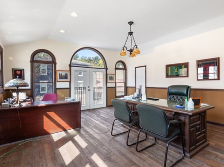 A kitchen at 213 Main St featuring: picture frame, furniture, table, cabinetry, countertop, wood, chair, drawer, kitchen, interior design
