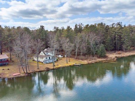 An image featuring water, cloud, sky, plant, natural landscape, tree, lake, land lot, lacustrine plain, house at 199 S Lake Rd.