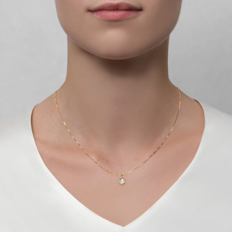 Solitaire No 6 Shorty aus 18 Kt Gelbgold mit Diamant, am Hals getragen