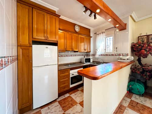 Rijwoning met 2 slaapkamers in Orihuela Costa — foto 12