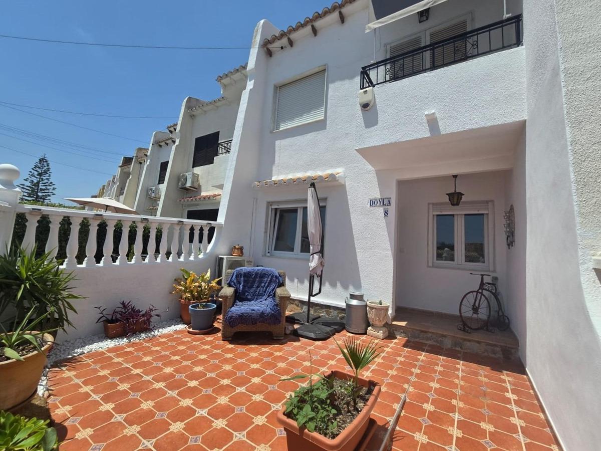 Gezellig geschakeld huis met terrassen en solarium in Los Balcones