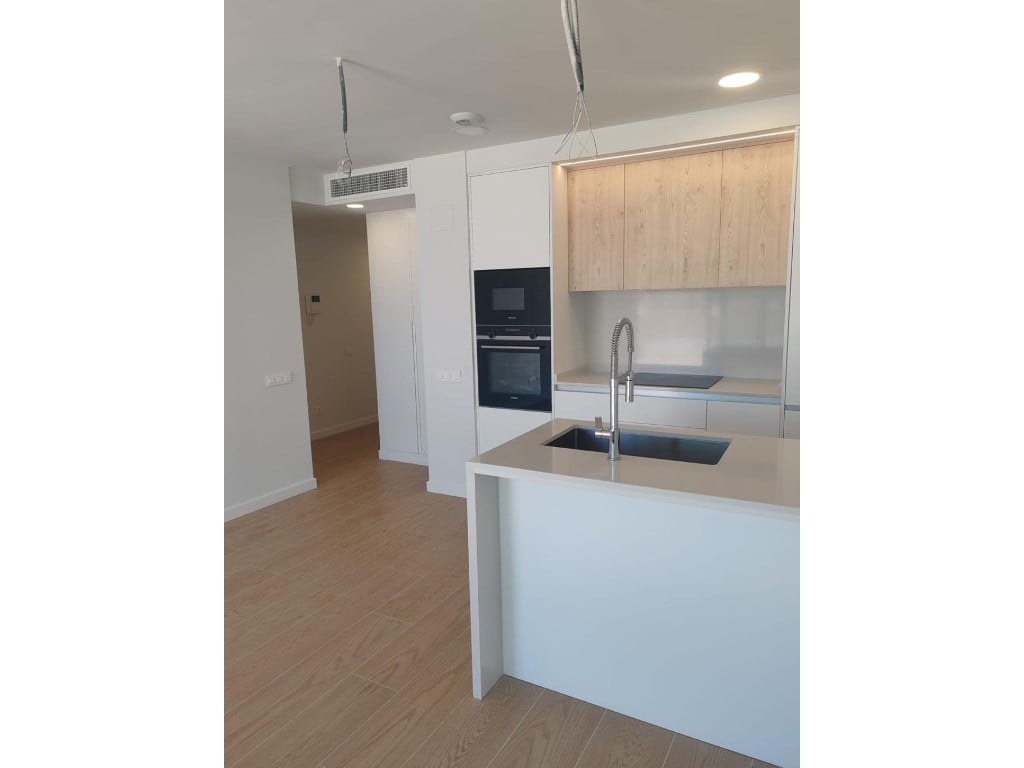 2-bed top-floor apartment with large terrace near beach in Dénia — living room
