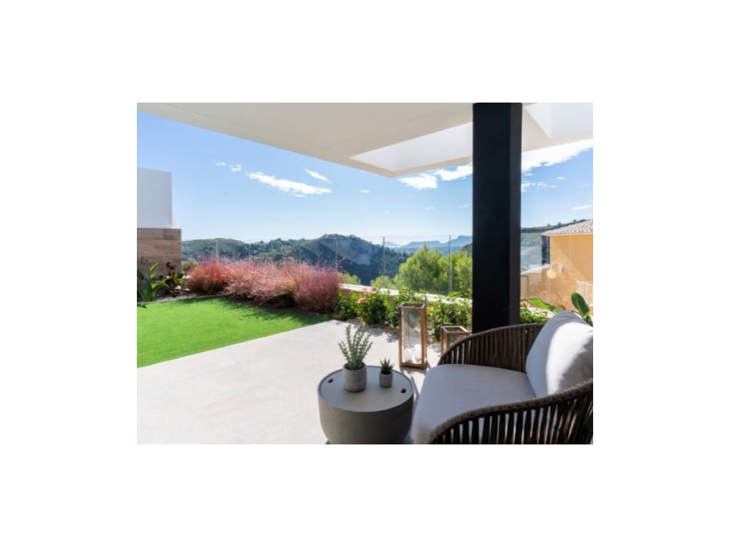 Luxury residential complex with sea views in Benitachell, Cumbre del Sol — living room