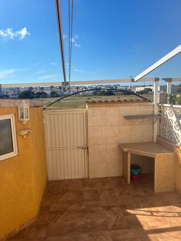 Rijwoning met 2 slaapkamers in Orihuela Costa
