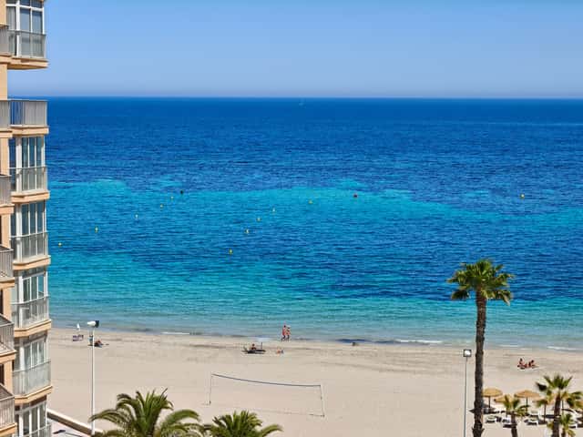 Prime beachfront! Dream apartment with sea and Peñón de Ifach views in La Fosa, Calpe