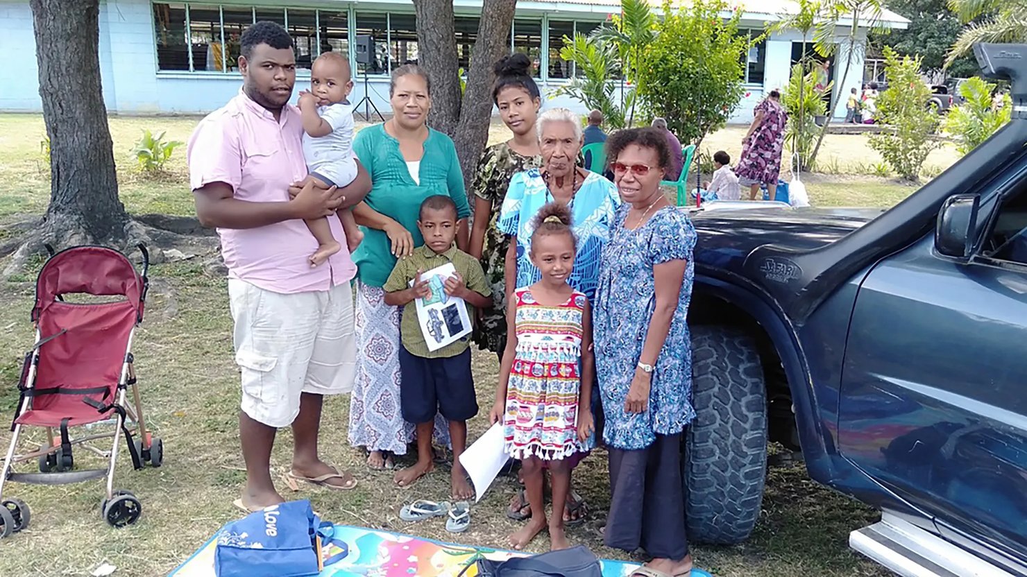 A Delana family outside their church in Port Moresby (photo courtesy and copyright Tapusi Kone, 2018)