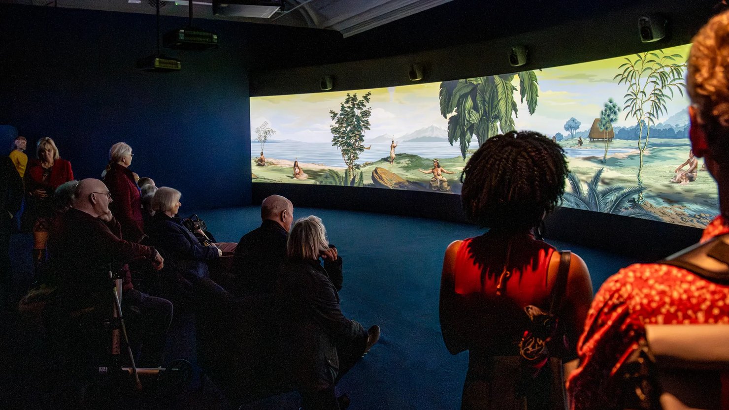 Audience watching Lisa Reihana's film in North Gallery
