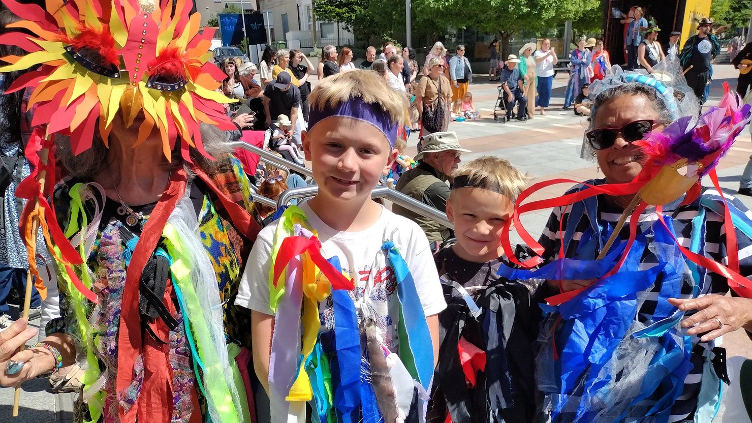 Families dressed in tatters made in a workshop