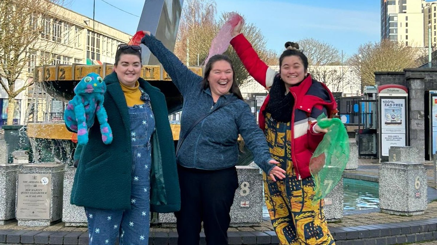 Becca Talemaimaleya and Above Bounds standing in front of the sundial in Plymouth