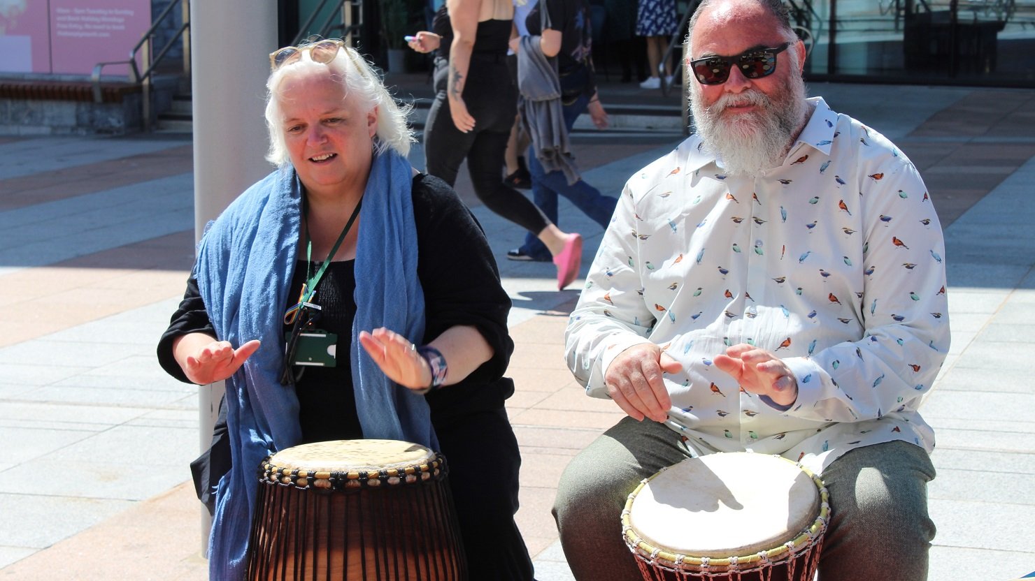 Councillor Jemima Laing drumming at The Bazaar event at The Box, Plymouth, summer 2023