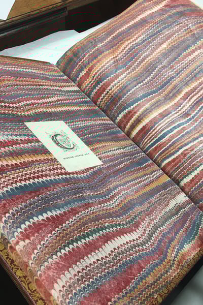 Marbled end papers from a 17th century volume at The Box Plymouth